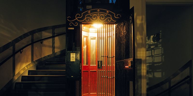 Elevator Operators in Tailcoats