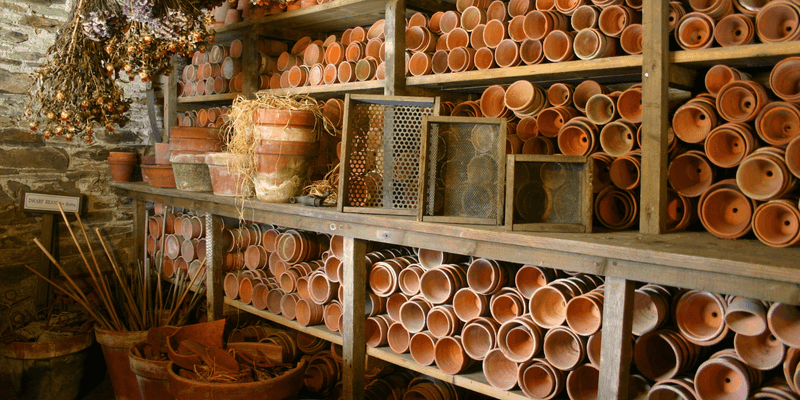 Using Broken Pots for Drainage