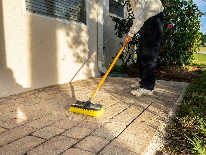 Sweeping Dirt Off Pavement – Wind, rain, and pets track it back instantly.