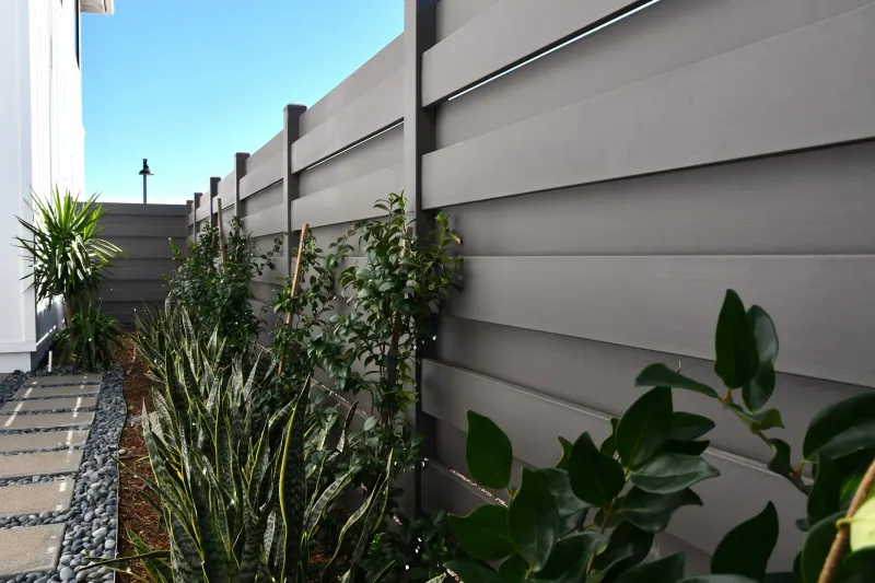 Break the fire pathways formed by fences, decks, and branches