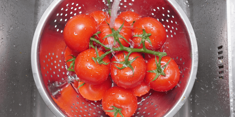 Rinse and trim cautiously, then use the tomato promptly