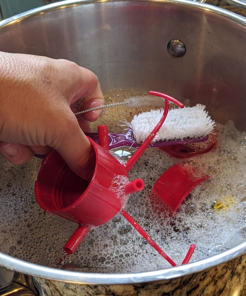 Empty, scrub, rinse, and dry the feeder