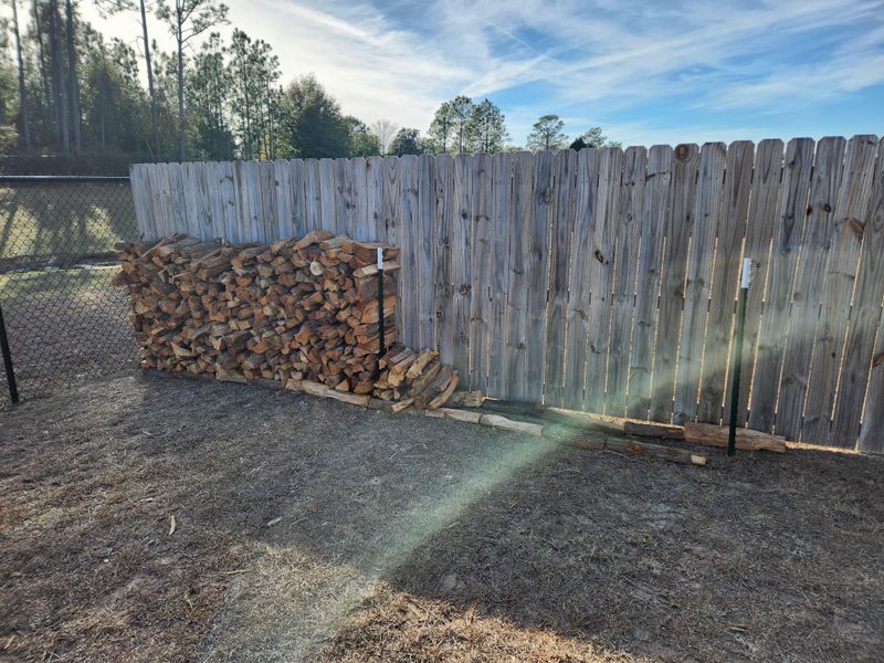 Move firewood and other stored combustibles away