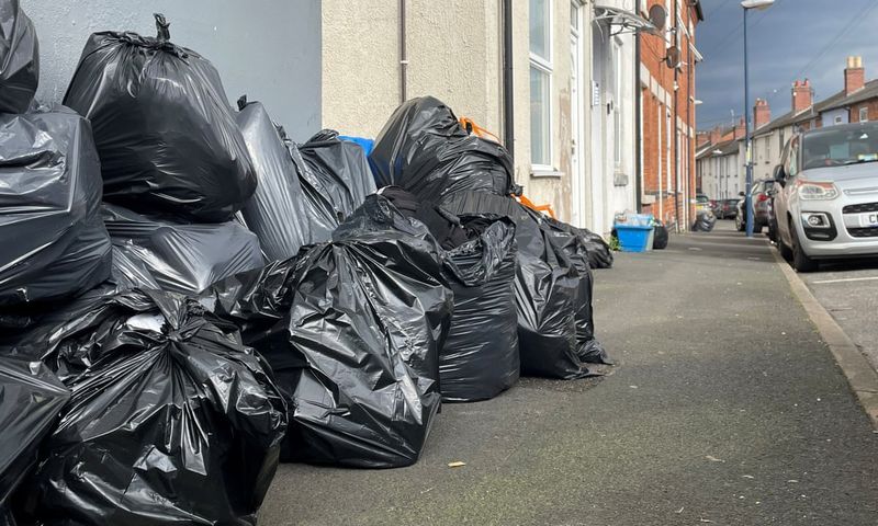 Parking Loose Trash Beside the House