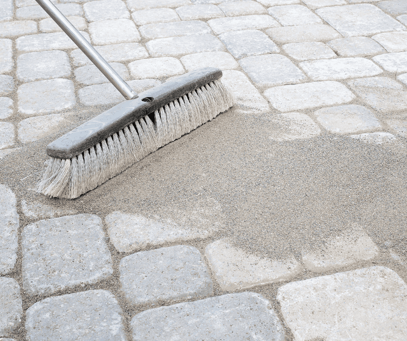 Use polymeric sand only when the system allows it