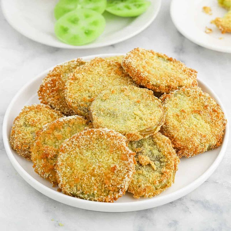 Use truly immature tomatoes in green-tomato recipes
